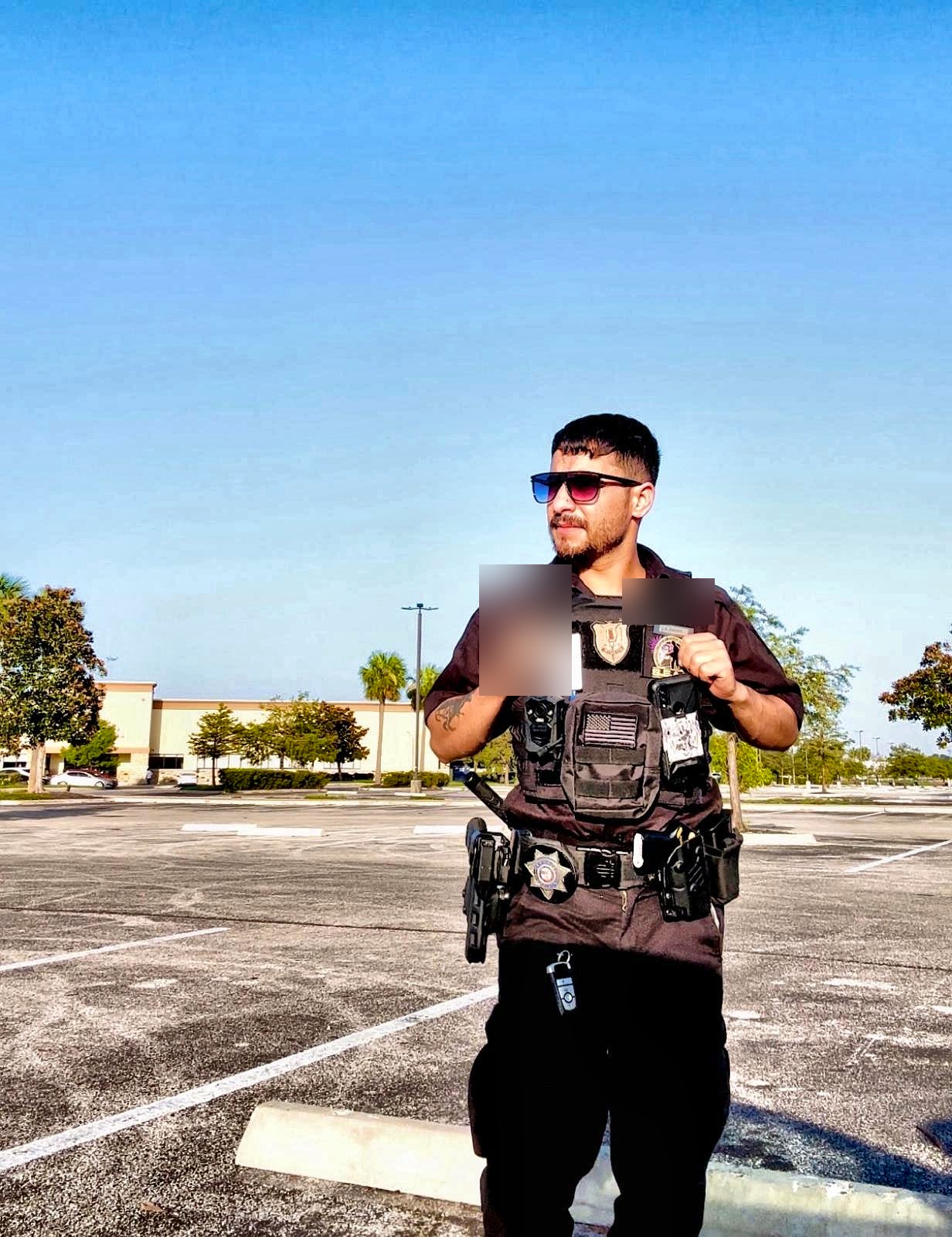 Black Force Security armed officer on post